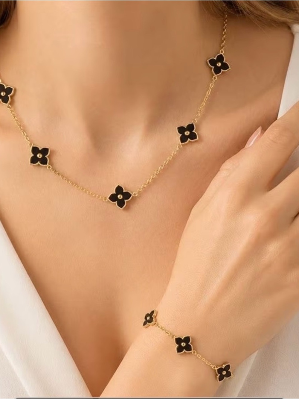 Gold Chain Necklace and Bracelet Set with Black Floral Charms